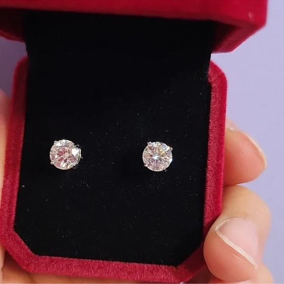 Elegant Silver Stud Earrings - Picture 2 of 4